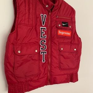 Red puffy vest —- Nike x Supreme